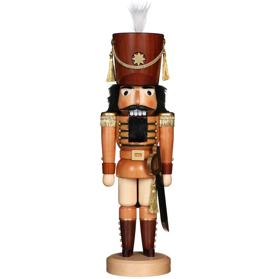 Wooden nutcracker figurine with a detailed outfit on a white background
