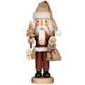 Wooden Santa Claus figurine with a beard, hat, and bag on a white background
