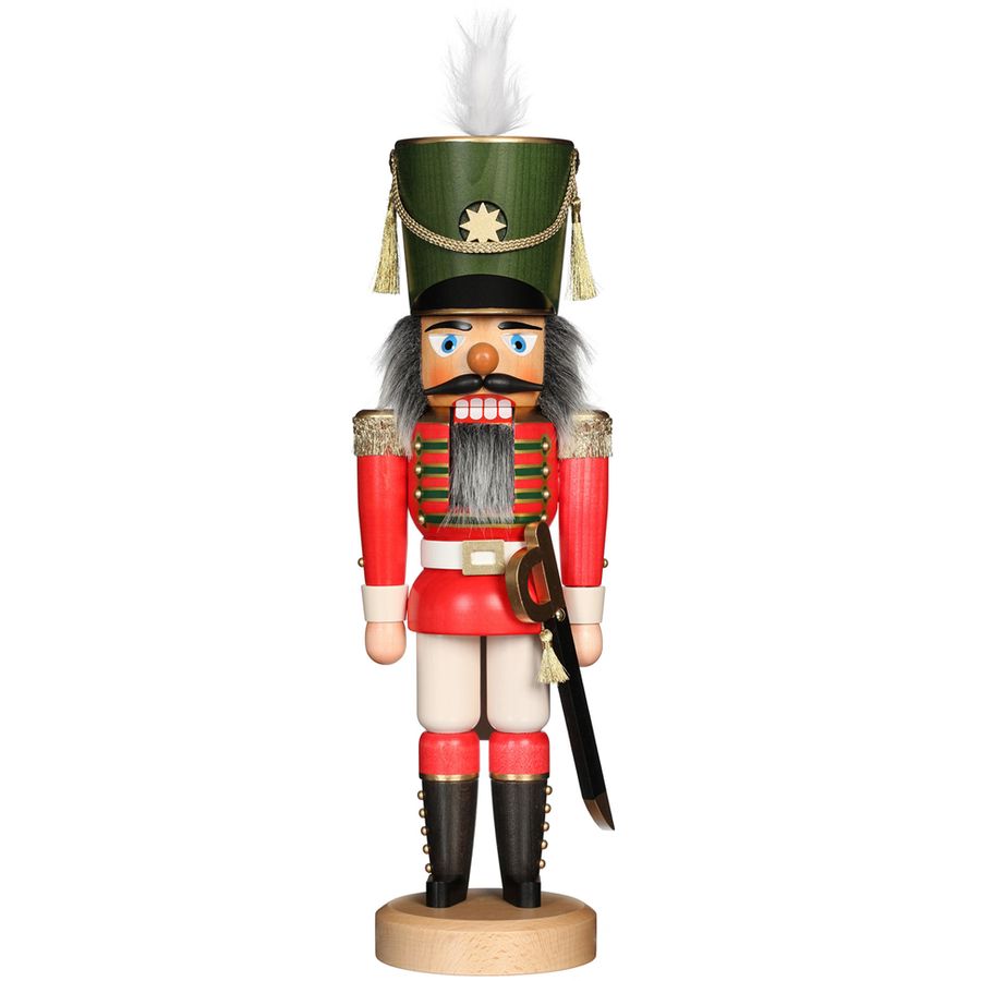 Wooden nutcracker figurine with a green hat and red outfit on a white background