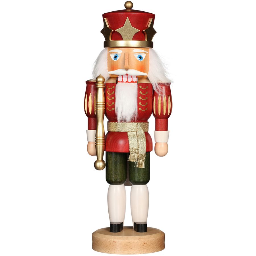 Wooden nutcracker figurine dressed as a king on a white background