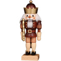 Wooden nutcracker figurine with a crown on a white background