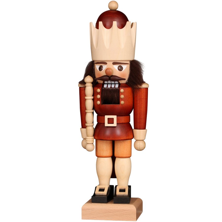 Wooden nutcracker figurine with a king's crown on a white background