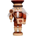 Wooden nutcracker figure with a hat, beard, and holding a mace on a white background