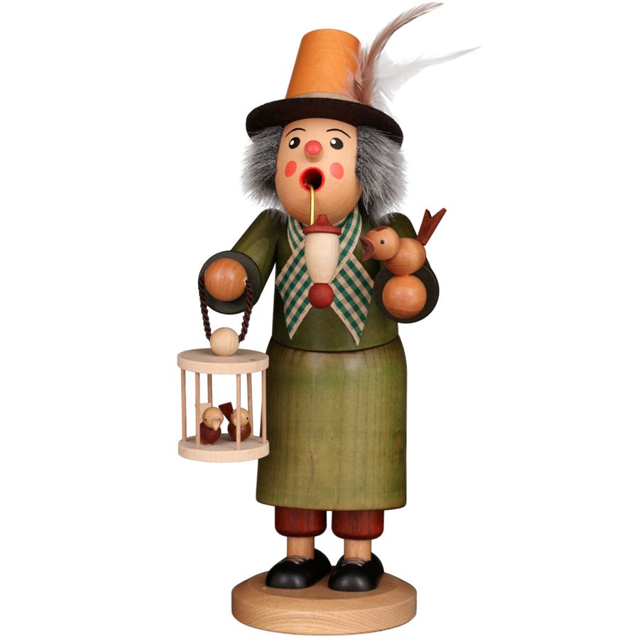 Wooden figurine of a character with a top hat, birdcage, and birds on a white background