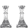 Two crystal candle holders on a white background